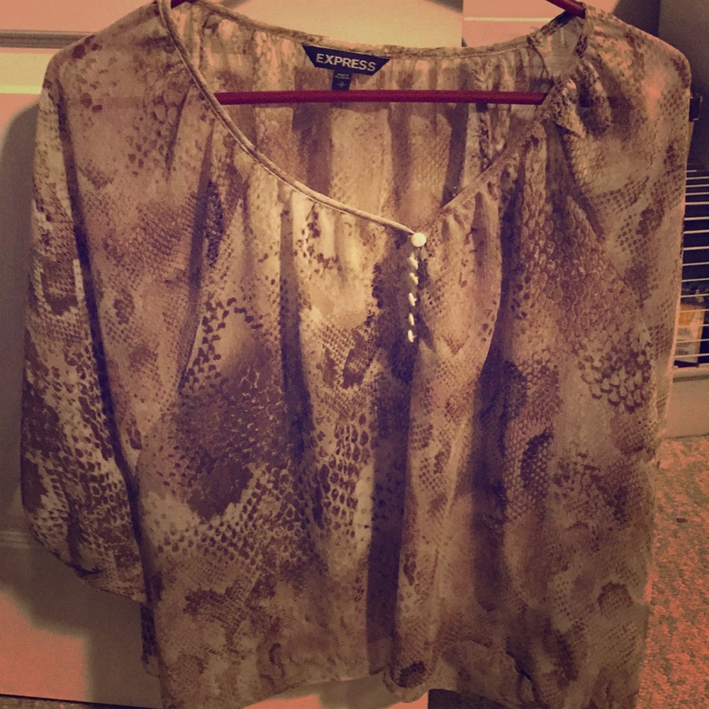 Cute tan blouse!